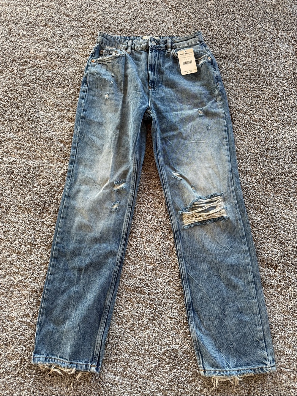 Distressed Light Blue Denim Jeans